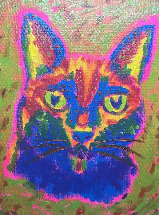 neon painting of a cat face in blue, pink, orange and green